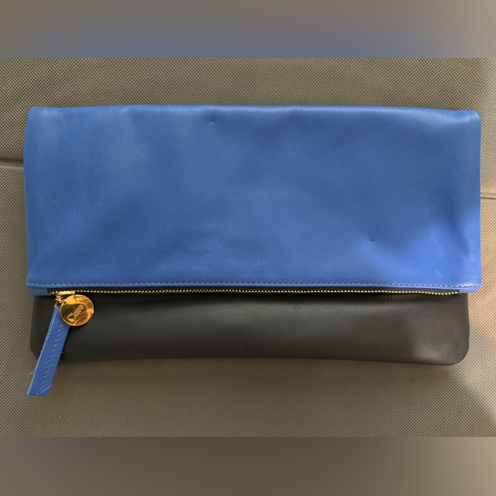 Clare V duo-tone leather fold-over clutch